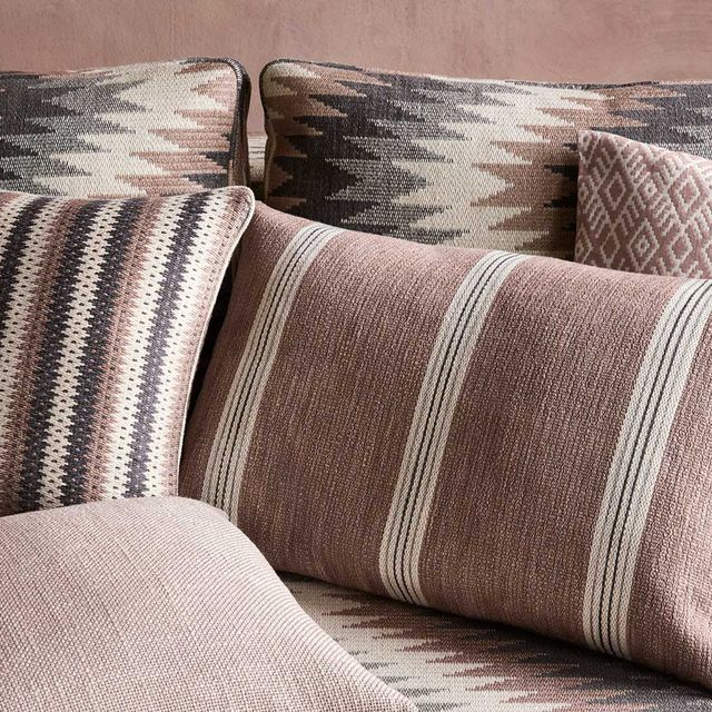 Pillows laid out on a bed