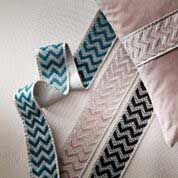 Coloured ribbon around a pillow